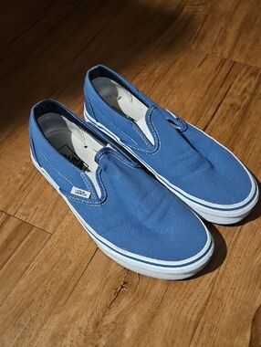 Vans Slip-On Canvas Sneakers in Light Blue with White Trim